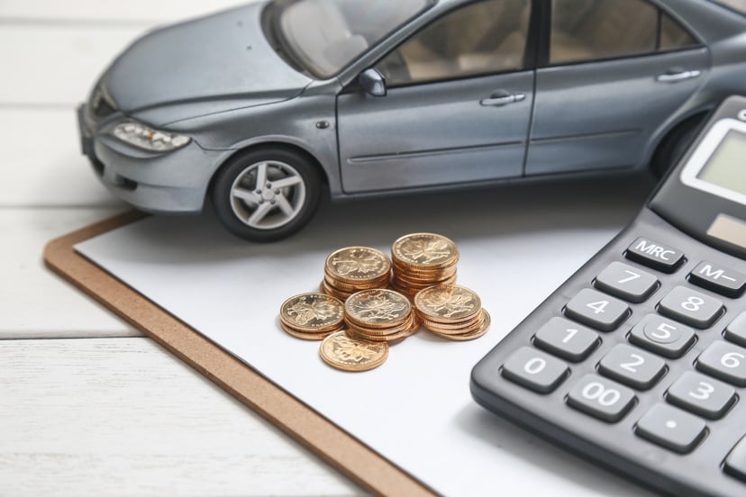 Editors%2 Fimages%2 F1646388079633 Car Model Calculator Coins White Table