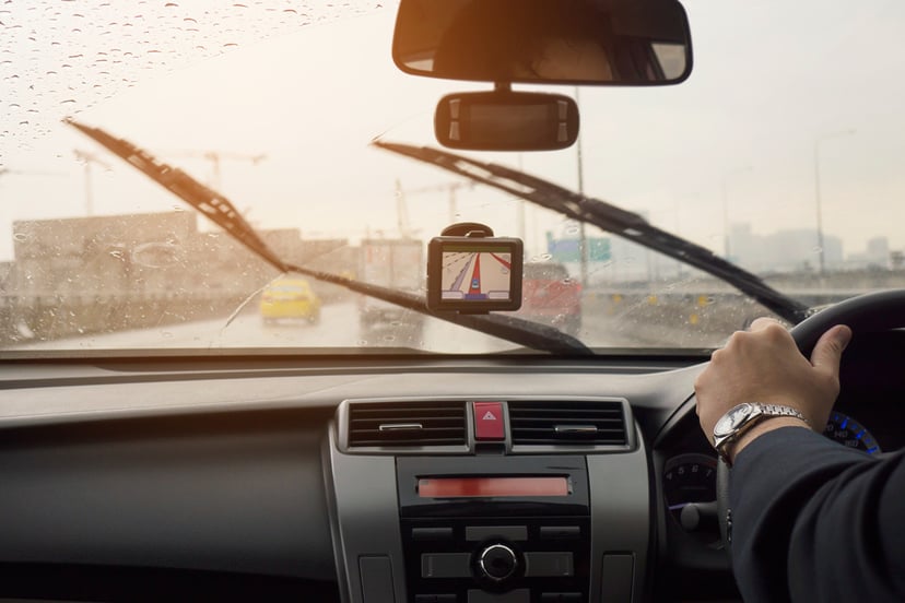 Business Man Is Driving Car Raining Day With Moving Wiper Blades