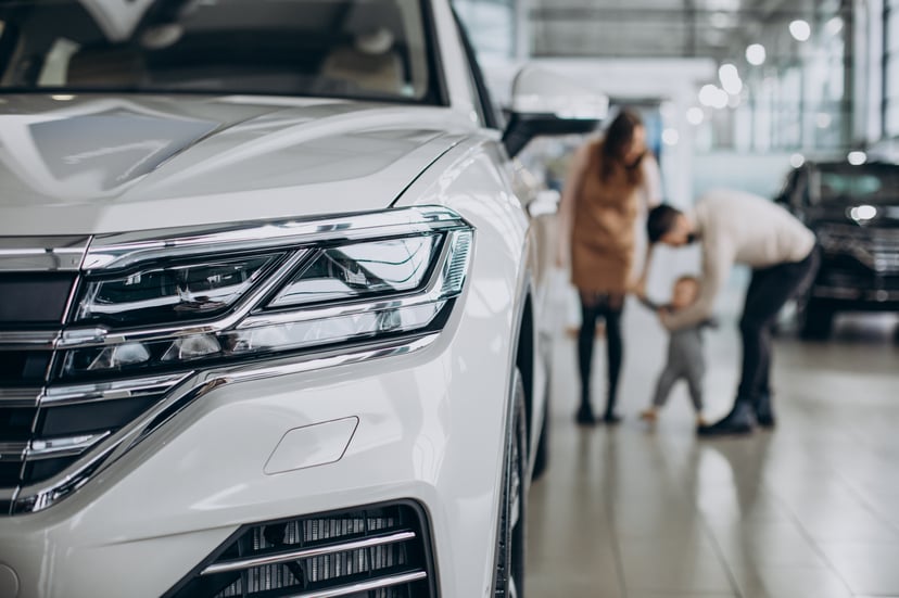 Editors%2 Fimages%2 F1658291295723 Family With Baby Girl Choosing Car Car Salon