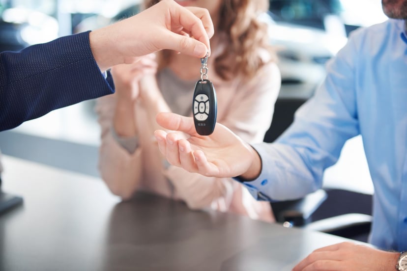 Close Up Car Keys Passing Customers Hands