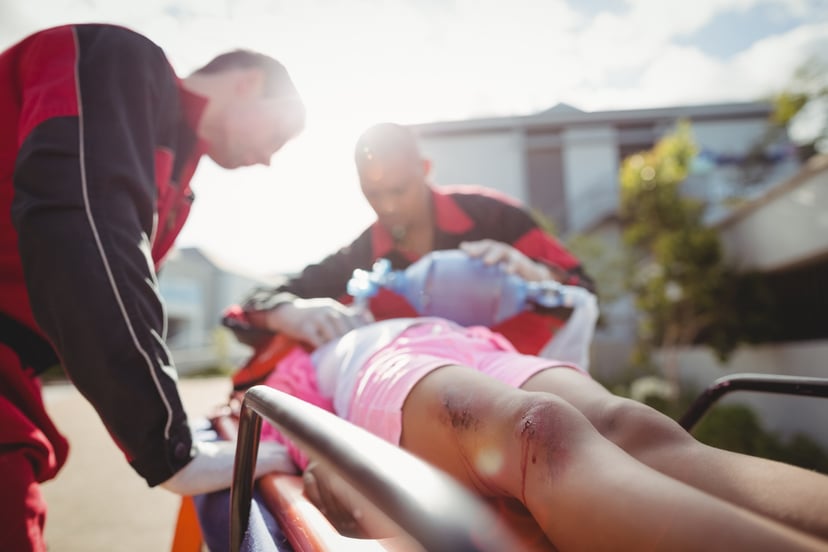 Paramedic Giving Oxygen Injured Girl
