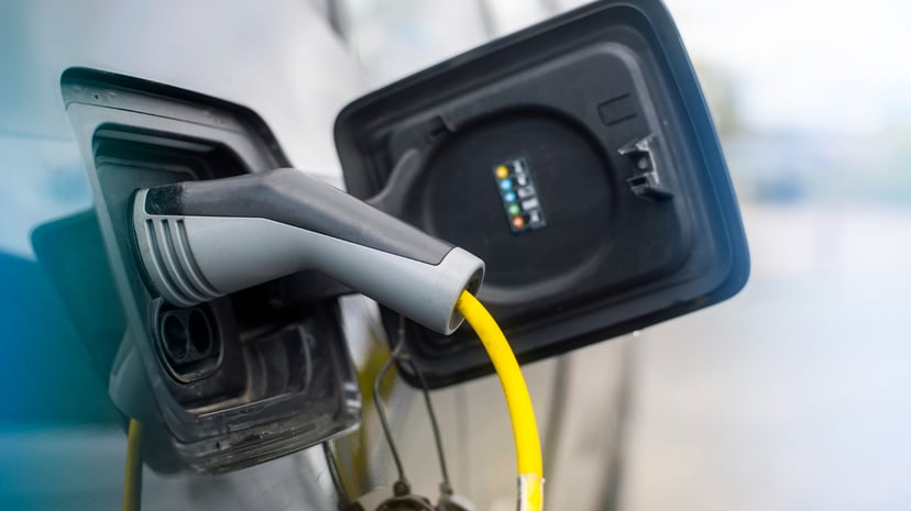 Editors%2 Fimages%2 F1665045581988 Plugged Charger Into Electric Car Charge Station