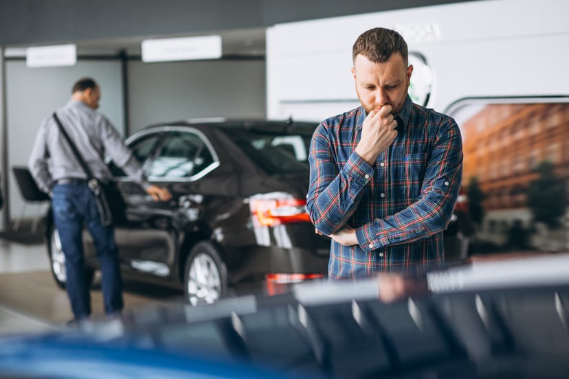 Young Man Choosing Car Car Showroom