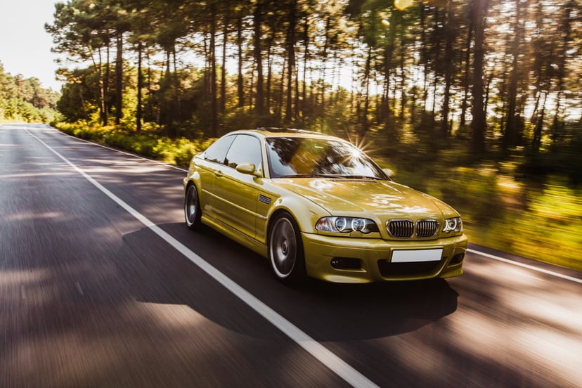 Green Haki Color Sedan Car Driving Road
