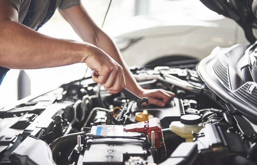 Editors%2 Fimages%2 F1696927313612 Muscular Car Service Worker Repairing Vehicle