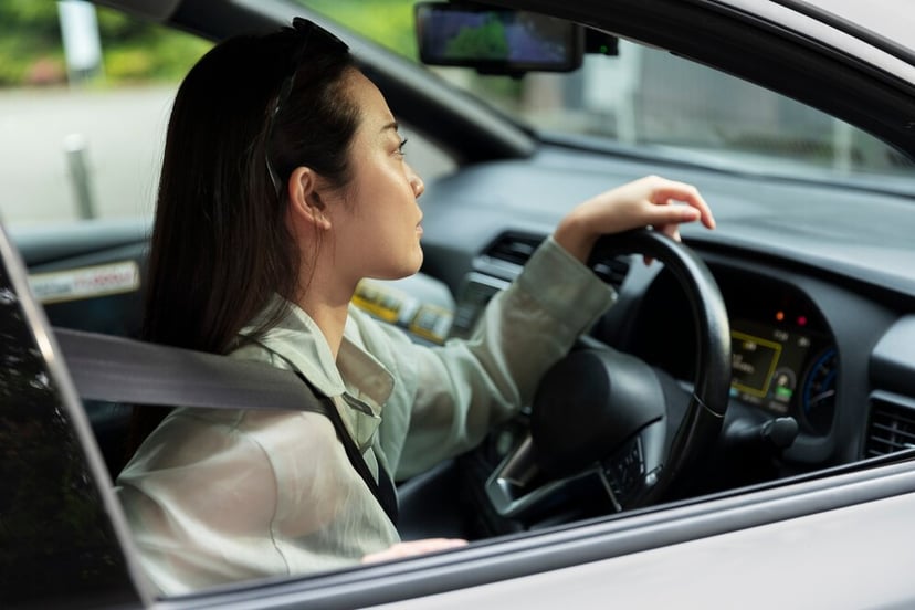 Female Driver Electric Car