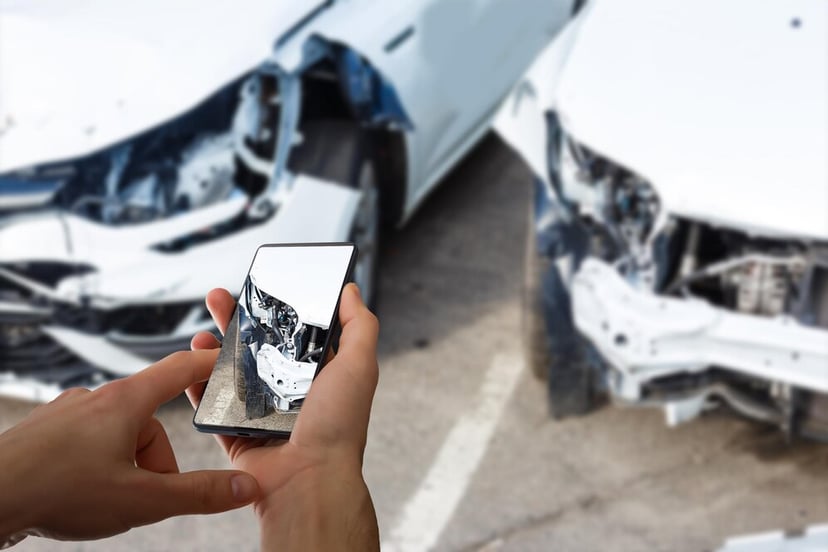 Man Photographing His Vehicle With Damages Accident Insurance With Smart Phone