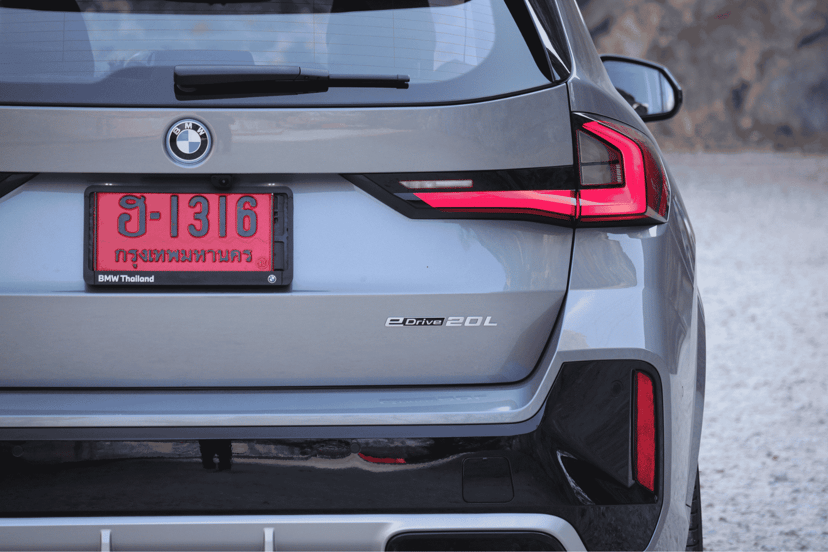 The BMW iX1 eDive20L S Sport badge at the rear